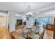 Spacious dining room with hardwood floors and a view into the living room at 19029 Us Highway 19 N # 12B, Clearwater, FL 33764