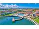 Aerial view of community with pool, dock, and waterway at 19029 Us Highway 19 N # 12B, Clearwater, FL 33764