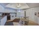 Shared kitchen with stainless steel appliances and granite countertops at 10216 Regal Dr # 708, Largo, FL 33774