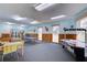 Community game room with ping pong and air hockey at 10216 Regal Dr # 708, Largo, FL 33774