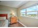 Bedroom with water view and wood floors at 10216 Regal Dr # 708, Largo, FL 33774