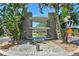 Community entrance with fountain and landscaping at 10216 Regal Dr # 708, Largo, FL 33774