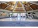 Large community room with high ceilings and ample seating at 10216 Regal Dr # 708, Largo, FL 33774