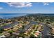 Aerial view of a canal-front home in a quiet neighborhood with water access at 1985 Michigan Ne Ave, St Petersburg, FL 33703