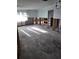 Home staging in progress, living room with new flooring and walls at 1985 Michigan Ne Ave, St Petersburg, FL 33703