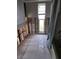 Renovation in progress, bathroom with new tile flooring and a window at 1985 Michigan Ne Ave, St Petersburg, FL 33703