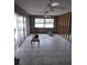 Living area with pool view, currently under renovation with exposed framing at 1985 Michigan Ne Ave, St Petersburg, FL 33703