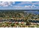 Aerial view of a house on the waterfront, near many other homes at 1985 Michigan Ne Ave, St Petersburg, FL 33703