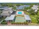 Community shuffleboard area with covered seating at 4411 Rustic Dr # 4411, New Port Richey, FL 34652