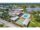 Community features pool, shuffleboard, and clubhouse near lake at 4411 Rustic Dr # 4411, New Port Richey, FL 34652
