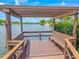 Relaxing waterfront gazebo with benches at 4411 Rustic Dr # 4411, New Port Richey, FL 34652
