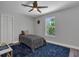 Small bedroom with a twin bed and blue rug at 1216 15Th S Ave, St Petersburg, FL 33705