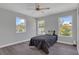 Bright bedroom with three windows, hardwood floors, and a twin bed at 1216 15Th S Ave, St Petersburg, FL 33705