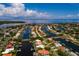 Aerial view showcasing a waterfront house in a canal-front community at 1985 Michigan Ne Ave, St Petersburg, FL 33703