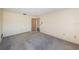 Spacious bedroom with grey carpet and ample closet space at 6944 S Shore S Dr, South Pasadena, FL 33707