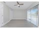 Spacious bedroom with sliding doors to the outside at 10517 Greenway Ave, Englewood, FL 34224