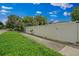 Well-maintained backyard with a white fence and lush green grass, perfect for outdoor activities at 1740 51St N St, St Petersburg, FL 33710