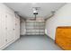 Garage interior with motorized door and shelving at 1740 51St N St, St Petersburg, FL 33710