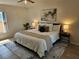 Serene main bedroom featuring a comfortable bed, stylish decor, and natural light at 1740 51St N St, St Petersburg, FL 33710