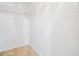 Walk-in closet featuring wire shelving for organized storage and tile flooring, ensuring functionality and style at 1740 51St N St, St Petersburg, FL 33710