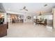 Open concept great room features a spacious dining room, flowing into a well appointed white kitchen at 4751 Baywood Point S Dr, Gulfport, FL 33711