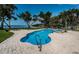 Backyard pool and spa with brick pavers, view of the water, and plenty of room for entertaining at 4751 Baywood Point S Dr, Gulfport, FL 33711