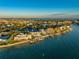 Stunning aerial view of waterfront homes, boat docks, and the inter coastal waters from above at 774 Nina Dr, Tierra Verde, FL 33715