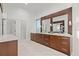 Elegant bathroom showcasing dual vanities, modern finishes, and a spacious layout at 774 Nina Dr, Tierra Verde, FL 33715