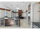 Modern kitchen bar with multiple appliances perfect for gatherings and socializing at 774 Nina Dr, Tierra Verde, FL 33715