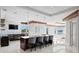 Spacious kitchen with island seating, stainless steel appliances and a view of the water at 774 Nina Dr, Tierra Verde, FL 33715