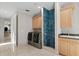 Laundry room with side-by-side washer/dryer, shower and built-in sink at 774 Nina Dr, Tierra Verde, FL 33715