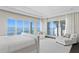 This spacious main bedroom offers water views, large windows and sitting area to enjoy the sunsets at 774 Nina Dr, Tierra Verde, FL 33715