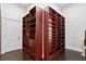 Expansive walk-in closet providing ample storage space with custom built-in shelving and drawers at 774 Nina Dr, Tierra Verde, FL 33715