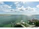 Expansive waterfront view showcasing boat docks, crystal-clear water, and the serene coastal lifestyle at 774 Nina Dr, Tierra Verde, FL 33715