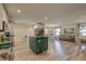 Open floor plan of the kitchen featuring a center island and view into the dining and living areas at 7809 Alafia Dr, Riverview, FL 33578