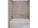 Bathroom with shower/tub and tile surround at 9 Haig Pl # 612, Dunedin, FL 34698