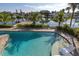 Stunning pool with a large sun shelf and water access at 12400 Capri N Cir # A, Treasure Island, FL 33706