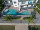 Aerial view of property showcasing pool and dock at 12400 Capri N Cir # A, Treasure Island, FL 33706