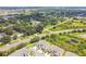 Aerial view of townhouses and surrounding landscape at 5228 New Friendship Pl, Tampa, FL 33619