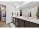 Double vanity bathroom with a large mirror and plenty of storage at 5228 New Friendship Pl, Tampa, FL 33619