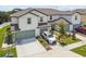 Two-story townhouses with attached garages and landscaped yards at 5228 New Friendship Pl, Tampa, FL 33619