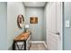 Hallway with a wooden console table and mirror at 5228 New Friendship Pl, Tampa, FL 33619