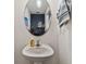 Clean bathroom with pedestal sink and oval mirror at 5228 New Friendship Pl, Tampa, FL 33619