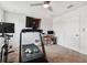 Home gym featuring treadmill, exercise bike, and workspace at 5228 New Friendship Pl, Tampa, FL 33619