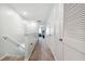 Upstairs hallway with access to bedrooms and linen closet at 5228 New Friendship Pl, Tampa, FL 33619