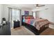 Large bedroom with a king-size bed and ample natural light at 5228 New Friendship Pl, Tampa, FL 33619