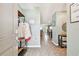 Bright entryway with wood-look floors and coat rack at 5228 New Friendship Pl, Tampa, FL 33619