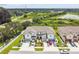 Townhome community view, showing homes and surrounding landscape at 5228 New Friendship Pl, Tampa, FL 33619