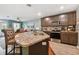 Modern kitchen with granite island, stainless steel appliances at 5228 New Friendship Pl, Tampa, FL 33619