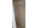 Empty closet with white walls and a single lightbulb at 6100 12Th S St # 211, St Petersburg, FL 33705
